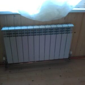 Алюминиевые радиаторы в деревянном доме