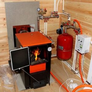 Установка твердотопливного котла